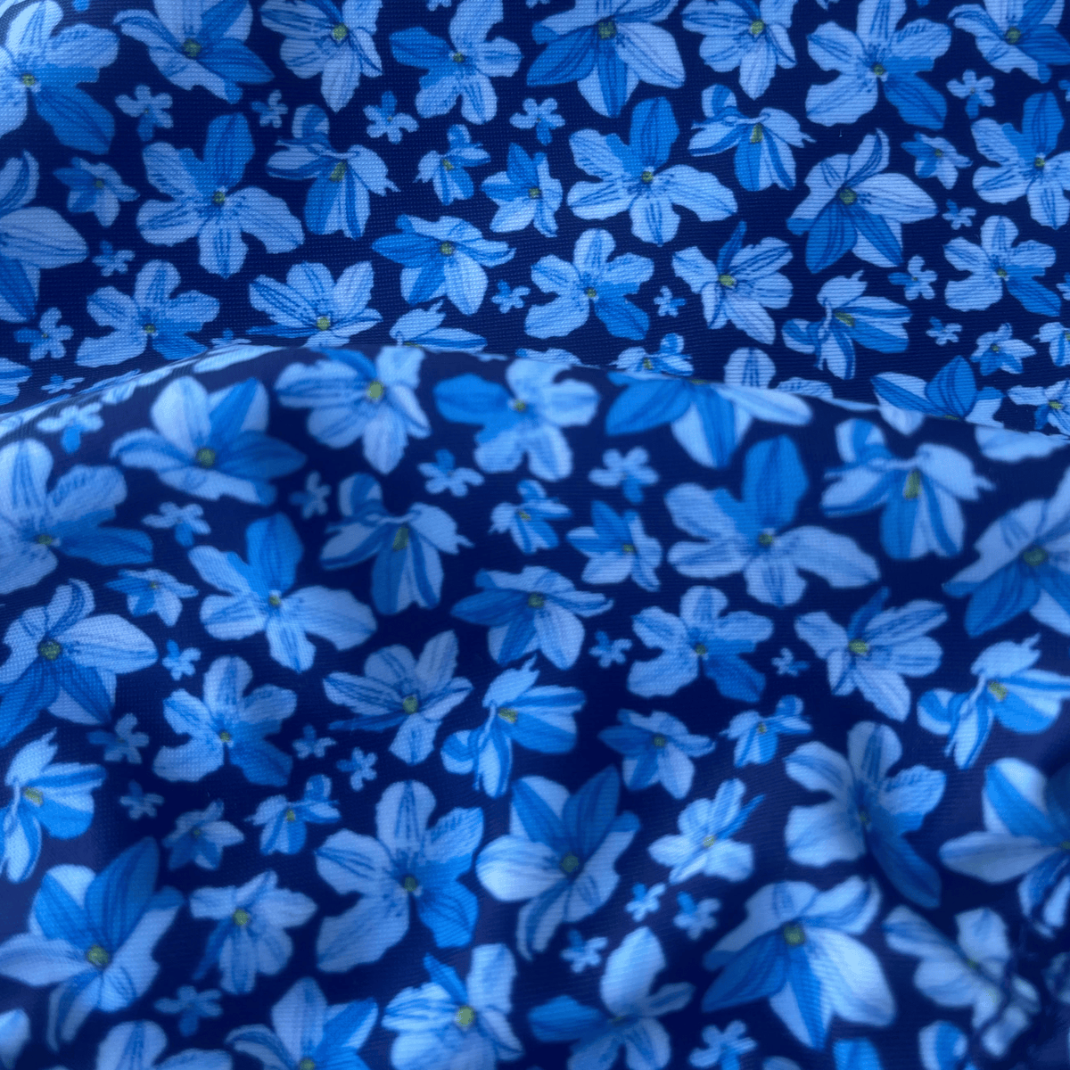 Kikx Extra Life Fastback Swimsuit in a Dark Blue Midnight Bloom Print