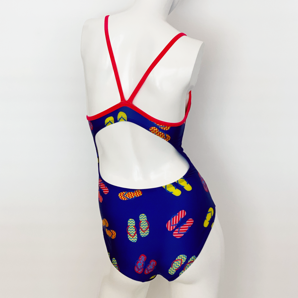 Kikx Extra Life Thin Strap Swimsuit in Slip Slops on Dark Blue with Bright Pink Straps