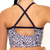 Kikx Crop Top with Thin Strap Criss Cross Back with Half Scoop Cutout in Leopard Print on White