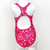 Kikx Extra Life Fastback Swimsuit in Full Print Flamingos in Splashes on Bright Pink