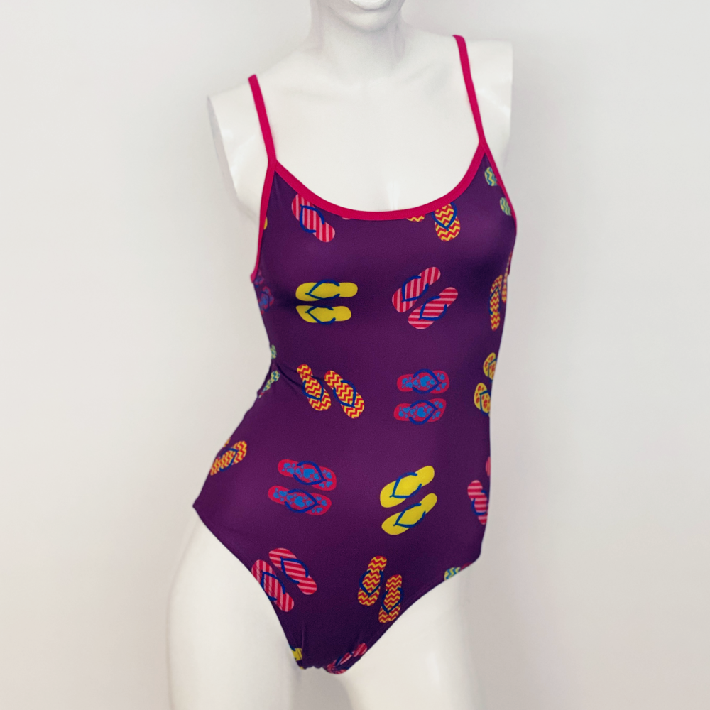 Kikx Extra Life Thin Strap Swimsuit in Slip Slops on Dark Purple with Bright Pink Straps