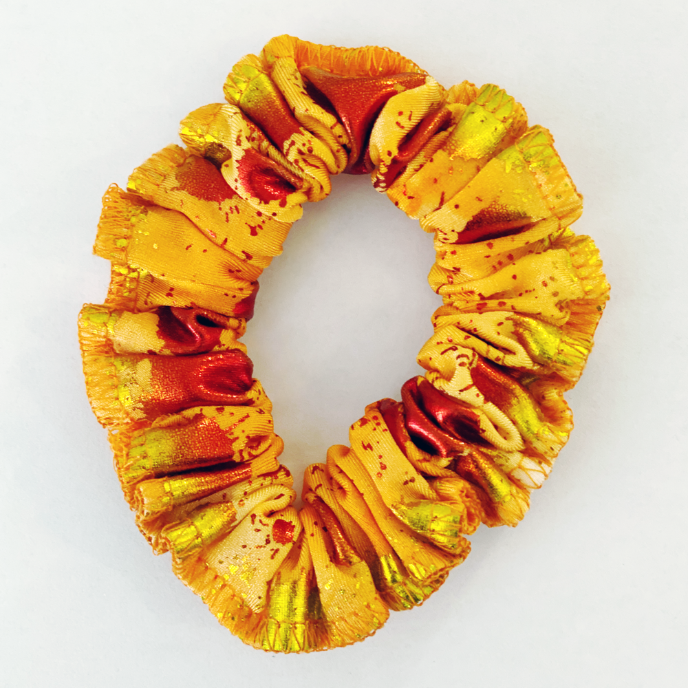 Kikx Gymnastics Hair Scrunchy in Orange with Yellow and Rust Foil
